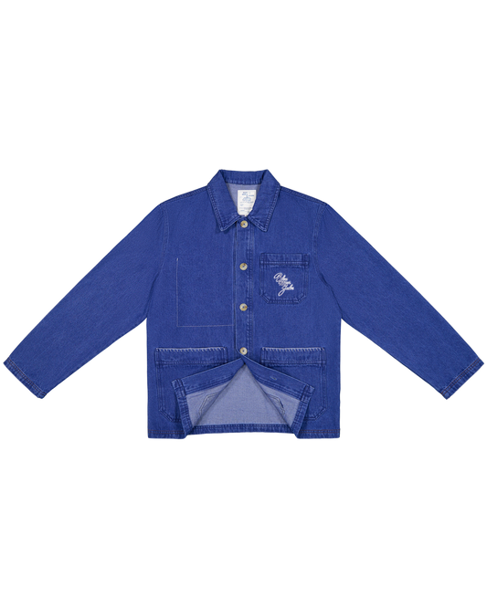 Veste en denim bleu indigo avec poches plaquées, col chemise et boutons apparents, coupe oversize décontractée
