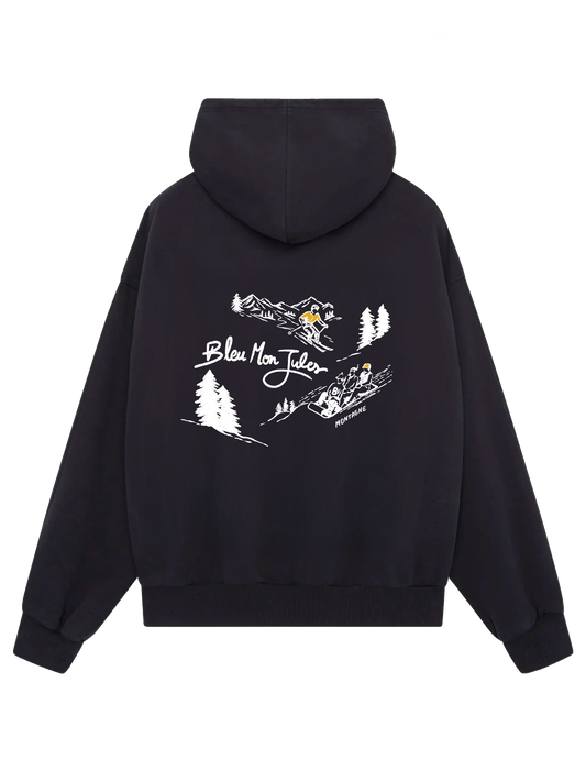 Sweat à capuche Mont Bleu Bleu mon Jules, vue dos, illustration montagne et ski rétro, collection hiver 2025-2026.