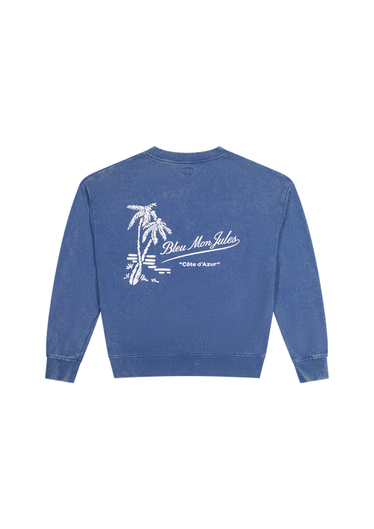 Dos sweat bleu délavé Bleu mon Jules, imprimé palmiers et lettrage "Bleu Mon Jules · Côte d'Azur", Saint-Tropez Été 2026